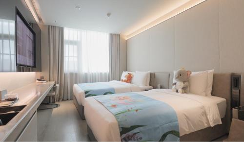 Xi'an Bell Tower Yongning Gate Orange Crystal Hotel – Xi'an City, LA