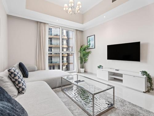 Urban Chic- Stylish 1BR Stay in Dunya Tower, Dubaj (fotografie 2)