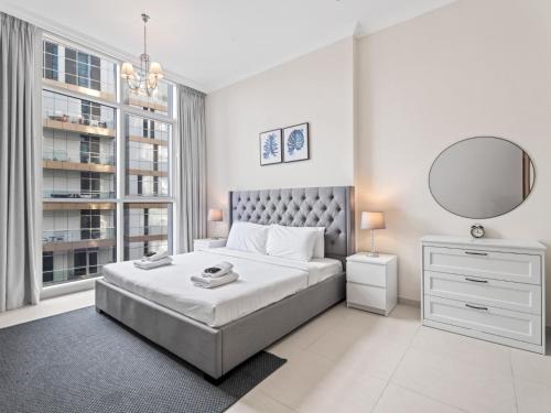 Urban Chic- Stylish 1BR Stay in Dunya Tower, Dubaj (fotografie 6)