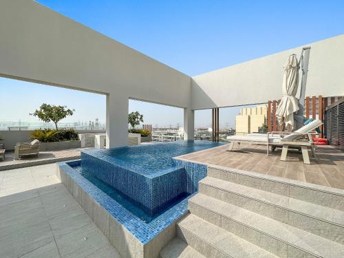 Vayk - Modern 2BR with Private Plunge Pool in JVC - image 2