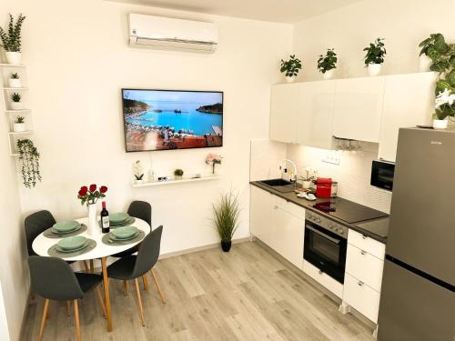 ห้องส่วนกลางสำหรับนั่งเล่น/ดูทีวี, VIBE S31 Apartman ,AC,Free Parking in วาราเลีย