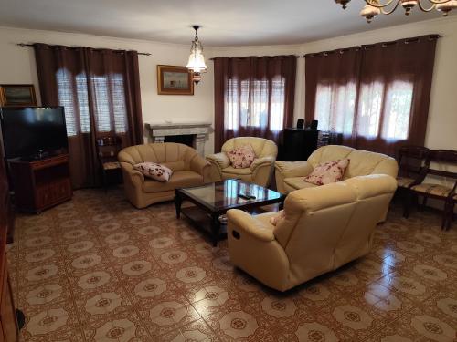 Közös társalgó / TV, Precioso chalet con gran algarrobo y piscina privada in La Xara