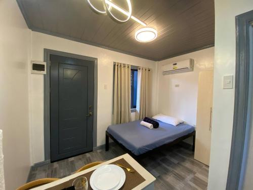 8-Door Room Apartment with Kitchenette and Air-Conditioned Individual Room in Tigatto