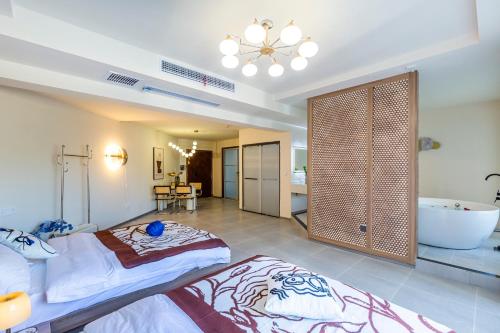 Deluxe Queen Room with Two Queen Beds image 2