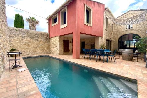 La Maison de la Place - Charming house with swimming pool & exposed stone in Mudaison