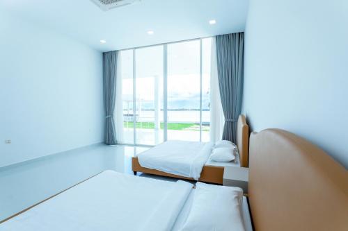 วิลลา 3 ห้องนอน 5 ห้องน้ำส่วนตัว ขนาด  ตร.ม. – ตาพราม (ផ្ទះទន្លេ - Ptas Tonle) in เกียน สวาย