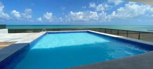 Piscina, Flat beira mar in Jardim Atlantico