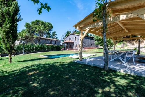 MAS PUIG PIQUÉ - piscina privada, porche, BBQ, y WIFI - 15 PERSONAS (MAS PUIG PIQUE - piscina privada, porche, BBQ, y WIFI - 15 PERSONAS) in Hostalric