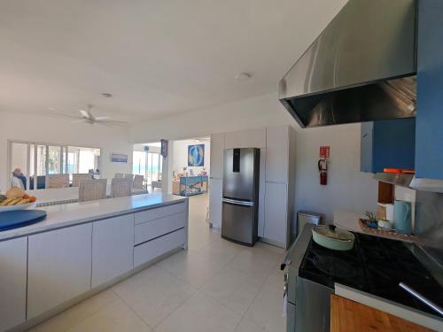 Kitchen, Luxury Oceanfront Villa with Heated Pool, Jacuzzi, AC, BBQ, Starlink Wi-Fi, Chef's Kitchen, Staff In in La Cienaga