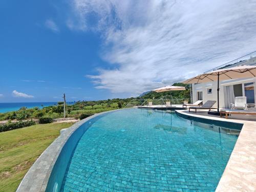 Exterior view, Luxury Oceanfront Villa with Heated Pool, Jacuzzi, AC, BBQ, Starlink Wi-Fi, Chef's Kitchen, Staff In in La Cienaga