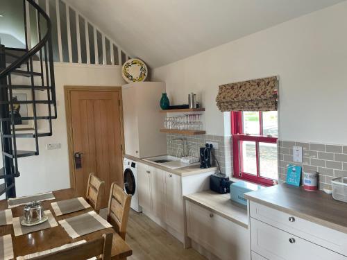 Dun Aengus Cottage on the Cliffs of Moher in Luogh South