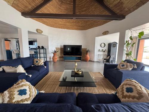 gedeelde lounge/tv-ruimte, Maison nakena in Rufisque