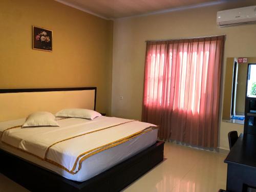 voodi, Hotel Bahagia Dua in Taubneno