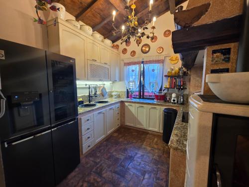 virtuve, La Casa Rossa - Villa con piscina privata in Localita Goraiolo
