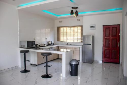 ห้องครัว, Lowin Suites-One-Bed Apartments in นโดลา