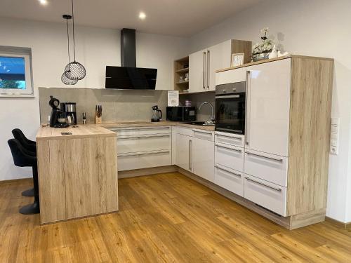 virtuve, Luxus Ferienhaus Geest und Moor in Grossheide