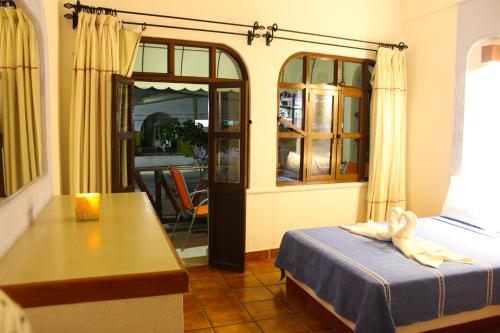 Hotel Careyes Puerto Escondido - 발코니/테라스