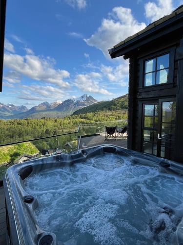 Exclusive Fjord Lodge with Private Jacuzzi and Epic Views in Stranda