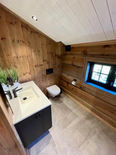 Exclusive Fjord Lodge with Private Jacuzzi and Epic Views in Stranda
