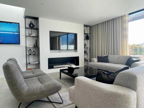 ห้องส่วนกลางสำหรับนั่งเล่น/ดูทีวี, Lux Hiato's Villa in ลูซ เด ตาวีรา