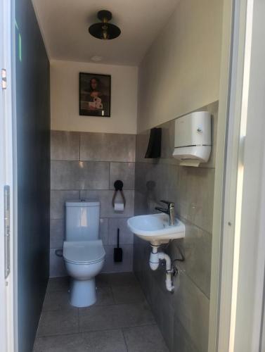 Natura Park Jurmala campsite with tent sites near a river in เจอร์มาลา