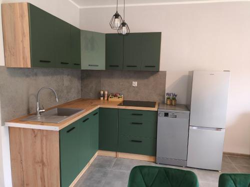 virtuve, Apartamenty LilaRóż (Apartamenty LilaRoz) in Wielkie Leźno