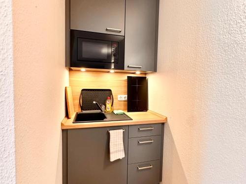 廚房, Bellahomes Smart TV Klima priv Parking Workation Long Stay in 埃爾倫塞