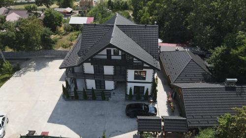 Pensiunea VERA&MIR in ฮูซี่