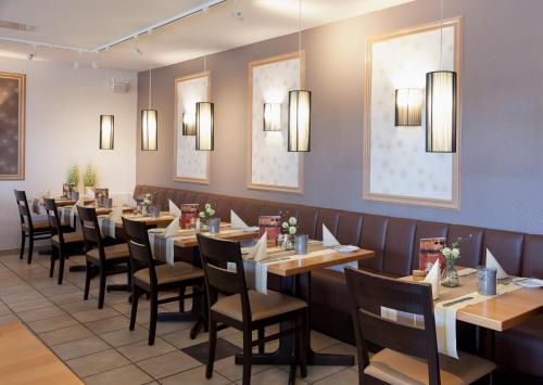 Restaurang, Hotel Pension Am Hafen in Norden