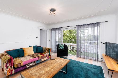 Chic 3 BR Home with Balcony & Free Parking - Tap to explore photos
