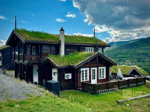 Stylish log cabin in Hafjell with view & sauna – khách sạn tại Oyer