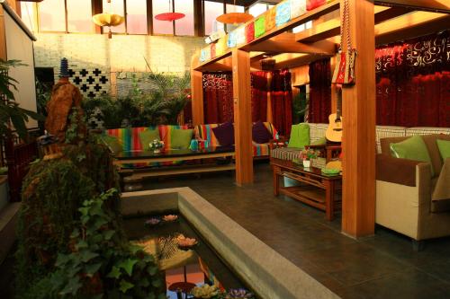 ห้องส่วนกลางสำหรับนั่งเล่น/ดูทีวี, Lanzhou Waiting for the Wind International Youth Hostel in หลานโจว