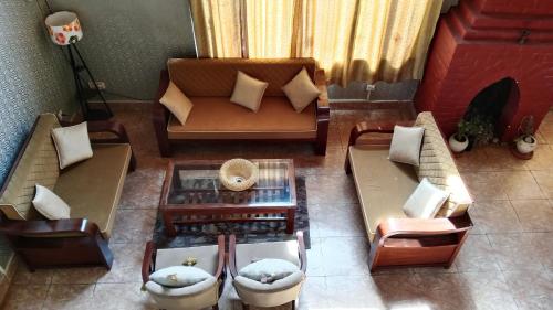 Quaint stays - By the river beas in พราน