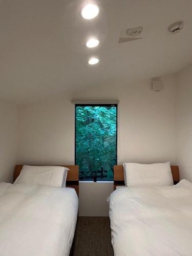 サンカーサ リバーサイド - 自然の中で暖をとる冬の隠れ家