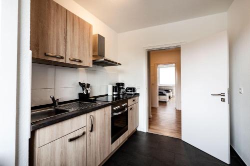 ห้องครัว, Work & Enjoy Apartments in Ahrensburg in อาเรนสบูร์ก