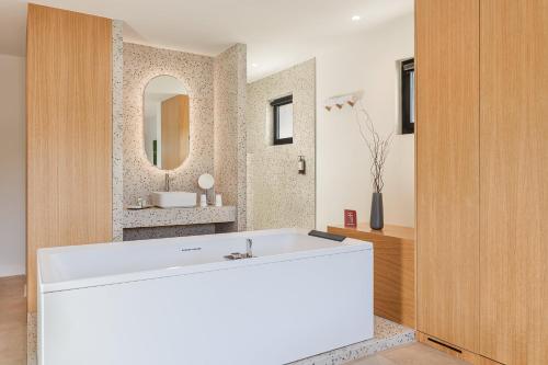 Signature Suite with Balcony and Spa Bath