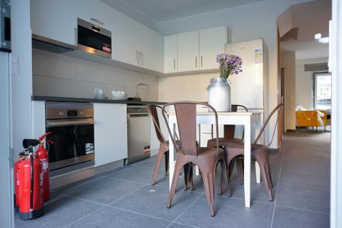 ห้องครัว, Largo Bispo Boutique Hostel in ฮอตา