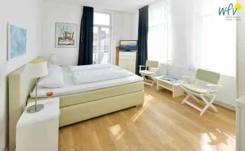 Haus Carl Stegmann Ferienwohnung FADAMA-HIN in จูอิส์ท