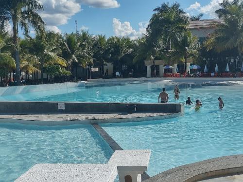 Swimming pool, Flats Lacqua diroma Roberto Imoveis near Cafe Brasil Panificadora e Lanchonete