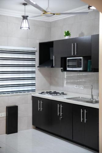 ห้องครัว, Nii Amar Residences in โซวูทุม