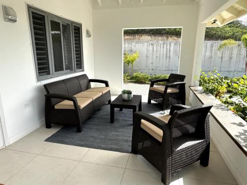 The Sunshine 3BR Villa Near Ocho Rios with Pool, Gym and Beach Access in Gated Community in Plantation Village