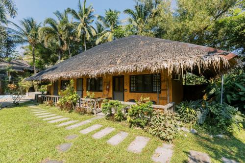 Nabulao Beach and Dive Resort Room Type - Standard Room with Small Terrace and Garden View