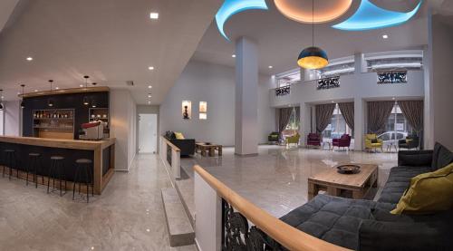 Közös társalgó / TV, Irini Hotel in Heraklion