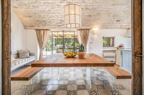 บริการและสิ่งอำนวยความสะดวก, Trulli, cicale e olive in เชลเย เมสซาปิกา