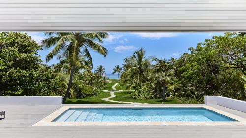 Garden, The Potlatch Club Boutique Hotel in Governors Harbour