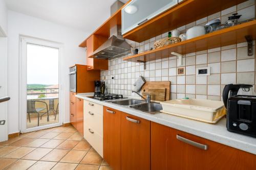 virtuve, Family Apartment Monsa in Porec in Musalez