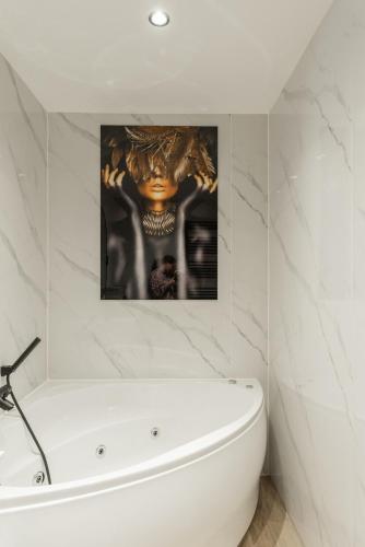 Boshuisje Seth sauna en whirlpool in Verspreide huizen Appelscha