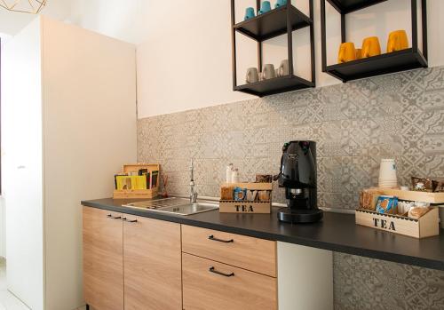 Kitchen, MIGLIO SACRO Suites in Capodimonte