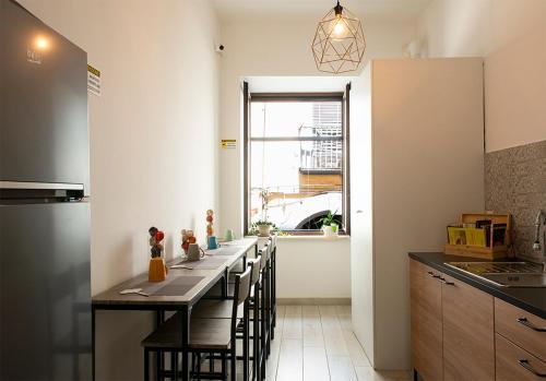 Kitchen, MIGLIO SACRO Suites in Capodimonte