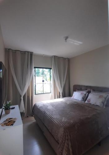 Apartamento de dois quartos centro de Pomerode in ริเบย์เราอาเรยา